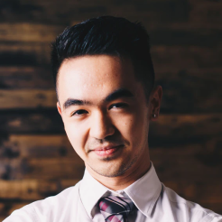 smiling young man in business suit